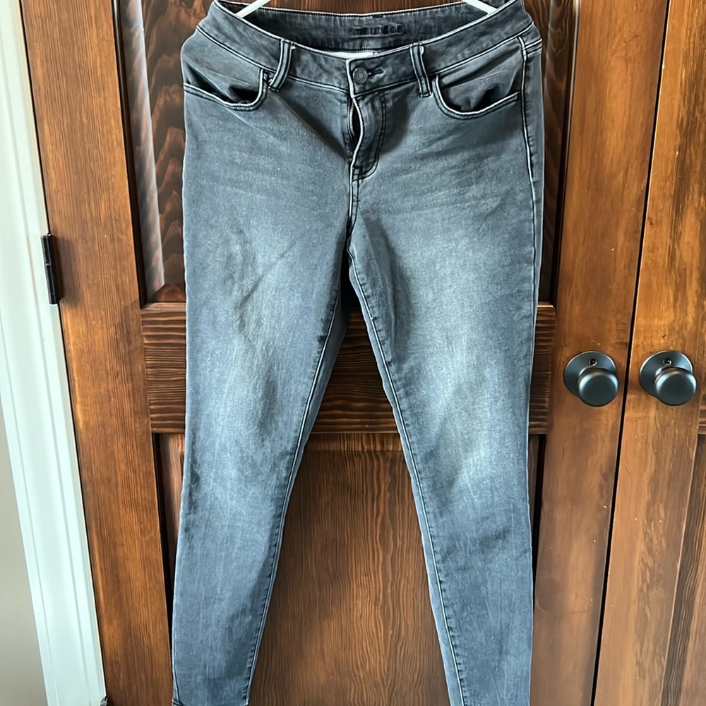 Medium tall black faded jeans.